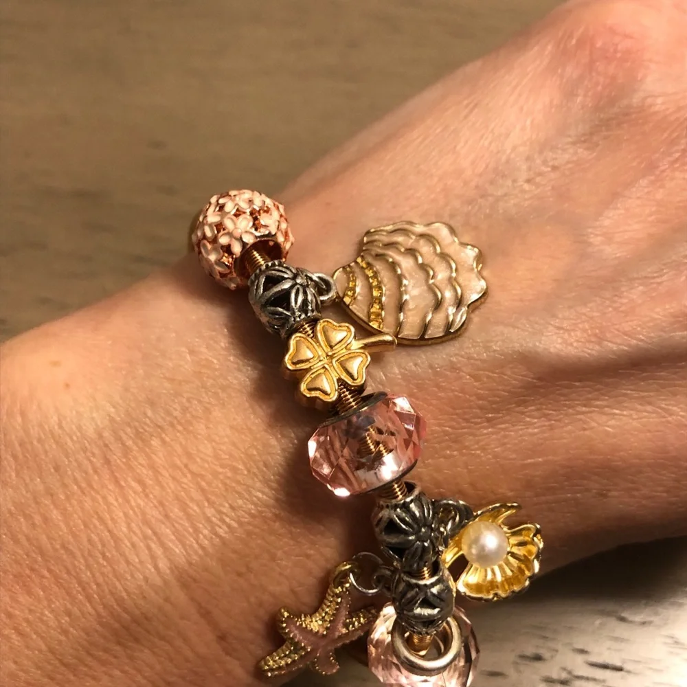 Elegant Gold Tone and Pink Stretchy Beach Theme Charm Bracelet